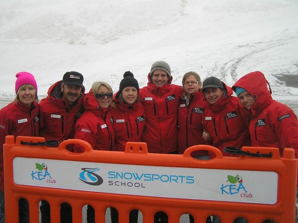 Snow Sports Head of Department Cesar Piotto (5th from left) is surrounded by ski and snowboard instructors in their new 2010 uniforms.